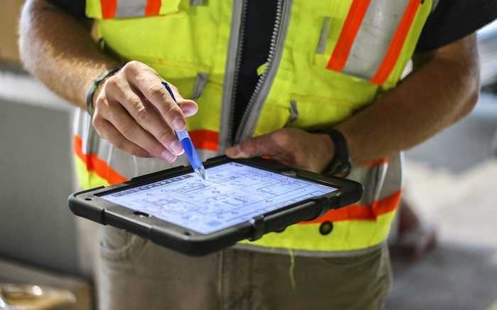 Worker Using Tablet